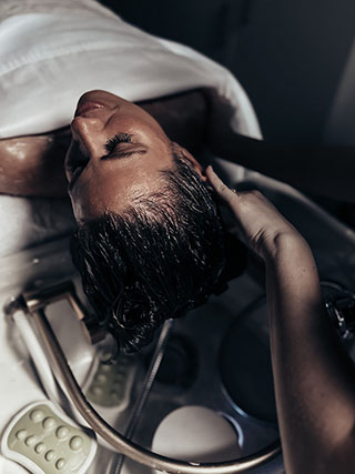 Woman Receiving Express Head Spa Treatment